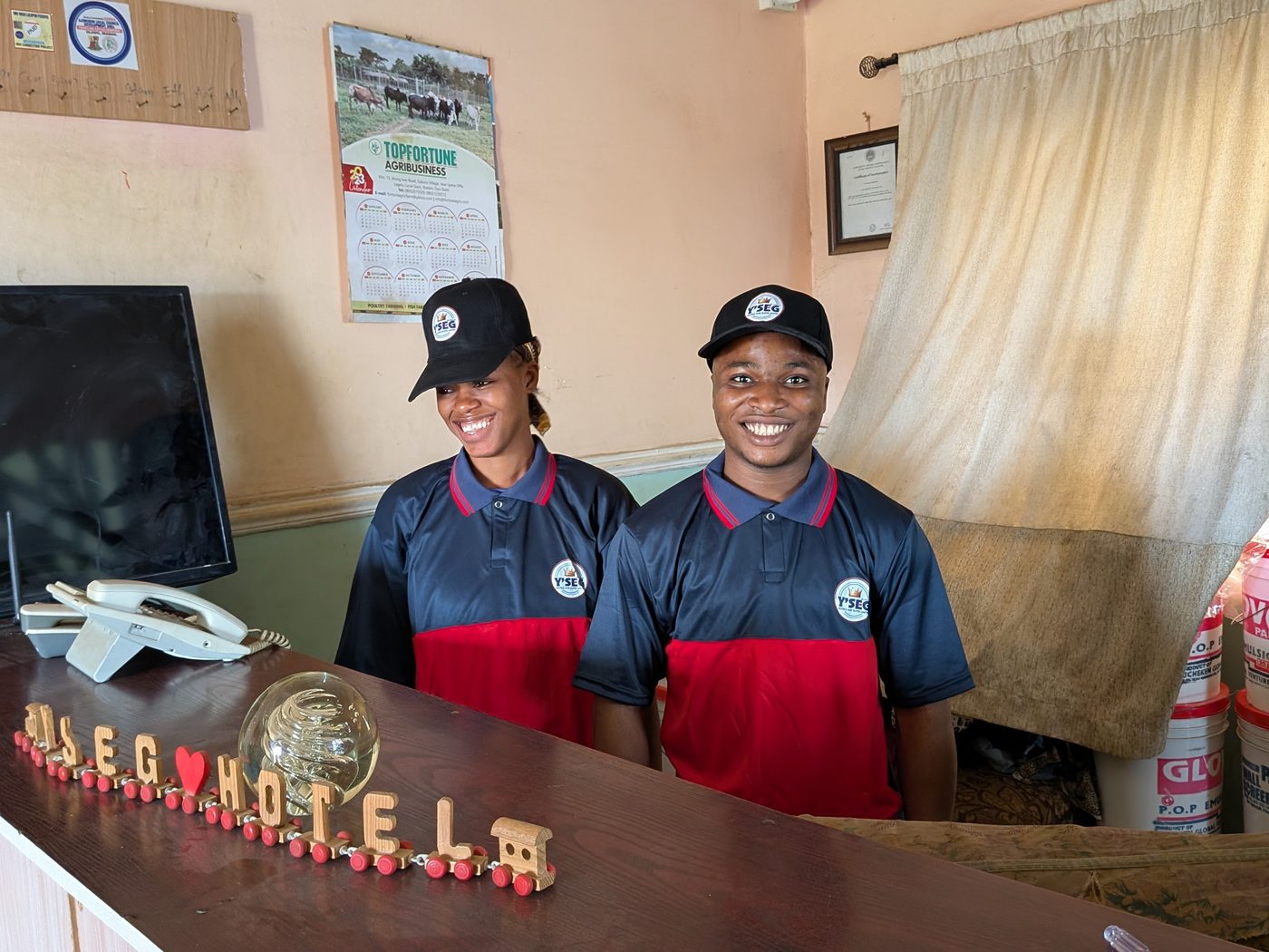 Y'SEG Hotels staff at the reception desk